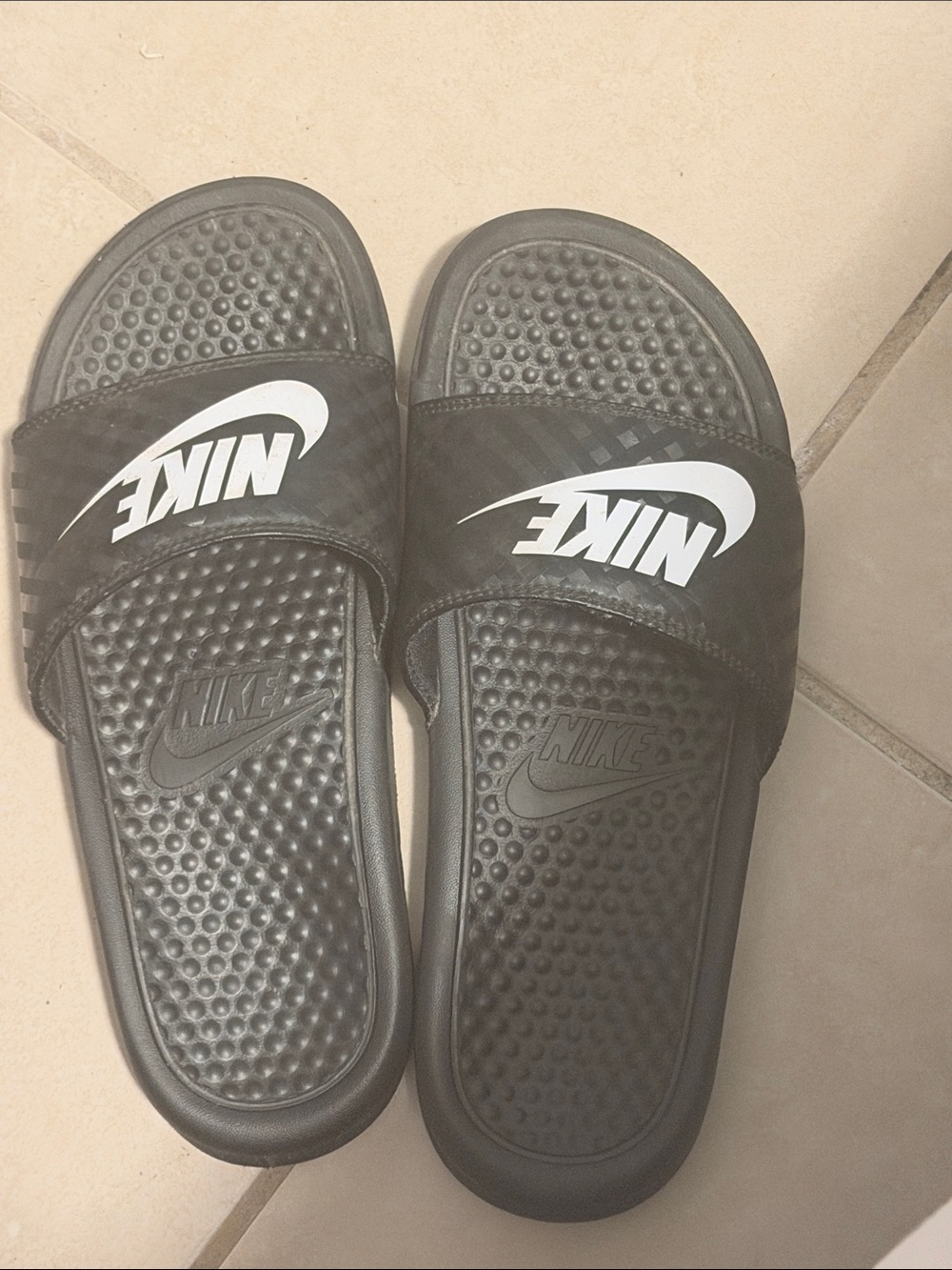Nike Black Slides with White Swoosh Logo